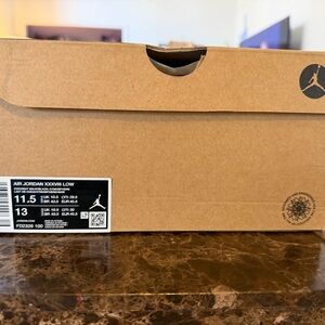 Jordan Air Jordan XXXVIII Low Coconut/Black/Atmosphere